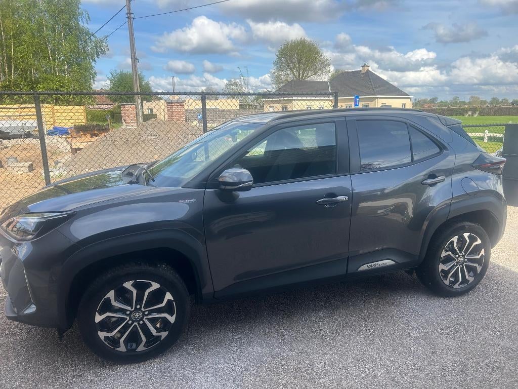 ToyotaYaris Cross B-Suv1.5TNGA HEV 2WD CVT Dynamic Plus LHD, Auto's, Toyota, Stof, 5 zetels, 5 deurs, Zilver of Grijs