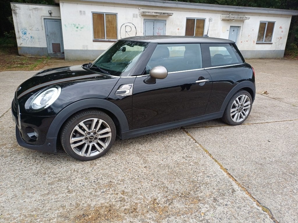 Mooie en uitstekend onderhouden MINI D Special Edition 7, Auto's, Mini, Voorwielaandrijving, Parkeerassistent, Leder en Stof, Zwart