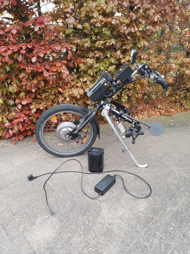 elektrisch aankoppelwiel voor rolstoel, Ophalen, Gebruikt, Stricker