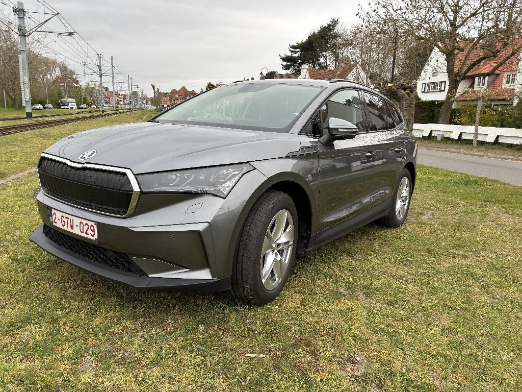 Skoda Enyaq iV 60 Corporate 62kWh (2025) met trekhaak, Auto's, Skoda, Automaat, Achterwielaandrijving, Leder en Stof, 5 zetels