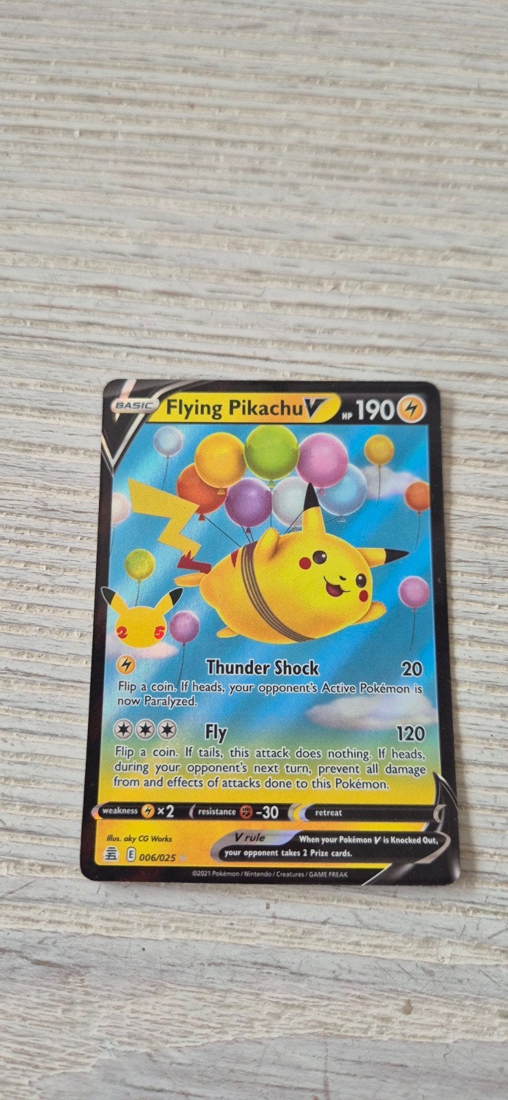 pokemonkaart flying pikachu V, Enlèvement