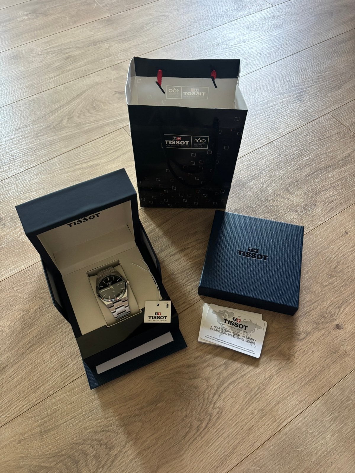 Tissot prx 40mm, Handtassen en Accessoires, Horloges | Heren, Overige merken, Staal, Staal, Polshorloge