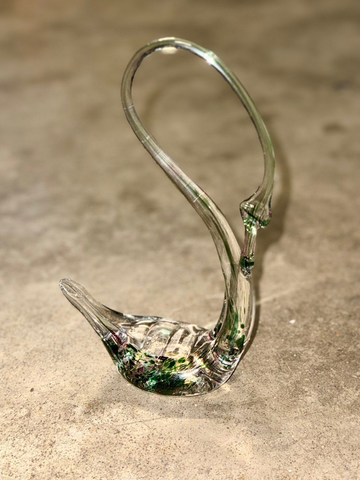 zwaan van geblazen glas, Ophalen