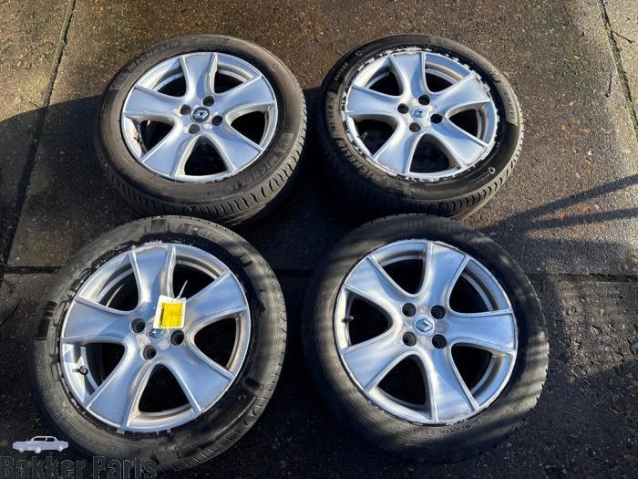 Sportvelgenset + banden van een Renault Clio, Auto-onderdelen, Banden en Velgen, Personenwagen, Gebruikt, 3 maanden garantie