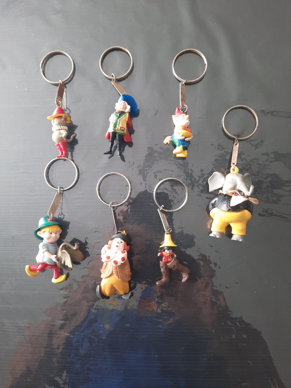 7 vieux porte-clés des années 1960, royco unox, calve, debet, Enlèvement ou Envoi, Utilisé, Peluche ou Figurine