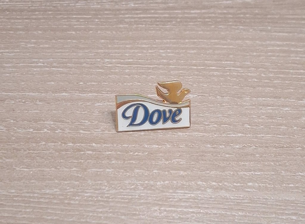 PIN - DOVE - COSMETICA - COSMETICS - DOUCHEGEL - DEODORANT, Envoi, Utilisé, Marque, Insigne ou Pin's