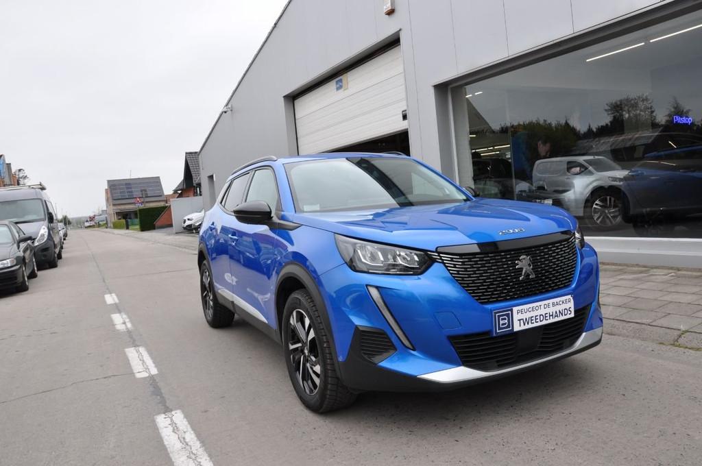 Peugeot 2008 Allure Pack (bj 2023, automaat), Auto's, Lichtsensor, Stof, Gebruikt, 1199 cc