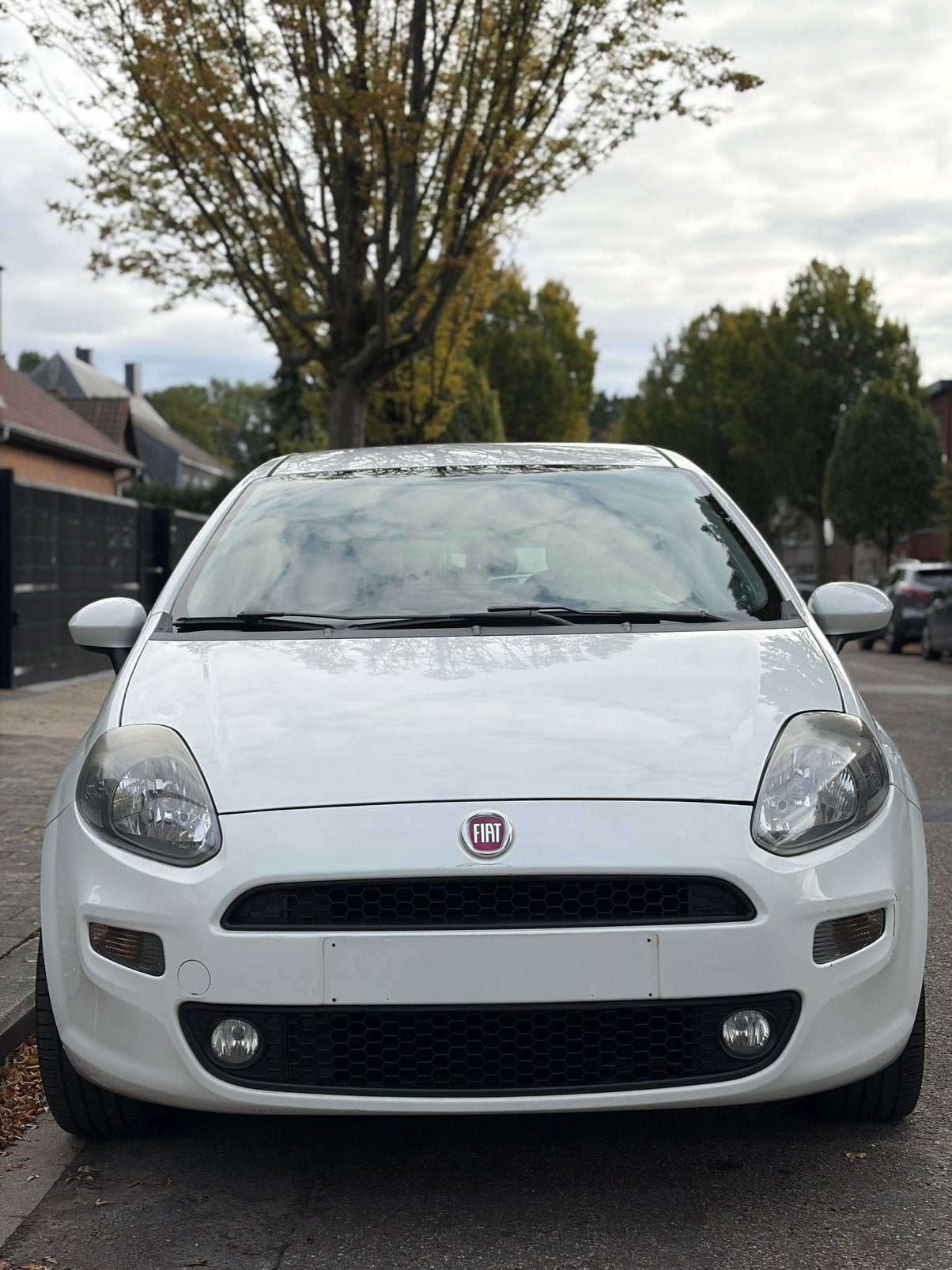 FIAT PUNTO EVO 1.2i LOUNGE AIRCO, Auto's, Voorwielaandrijving, Euro 5, Stof, Wit