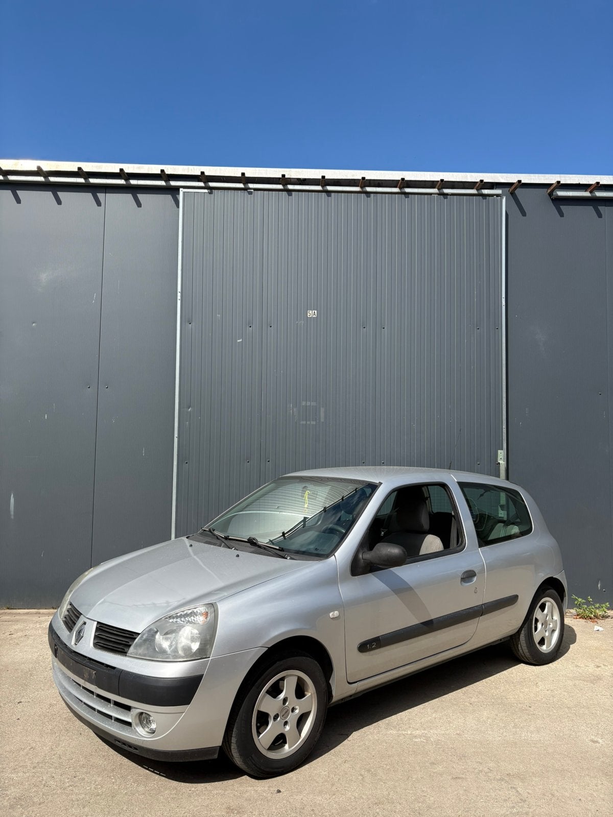 Renault Clio II 1.2 Benzine 2006, Voorwielaandrijving, Stof, Handgeschakeld, Grijs