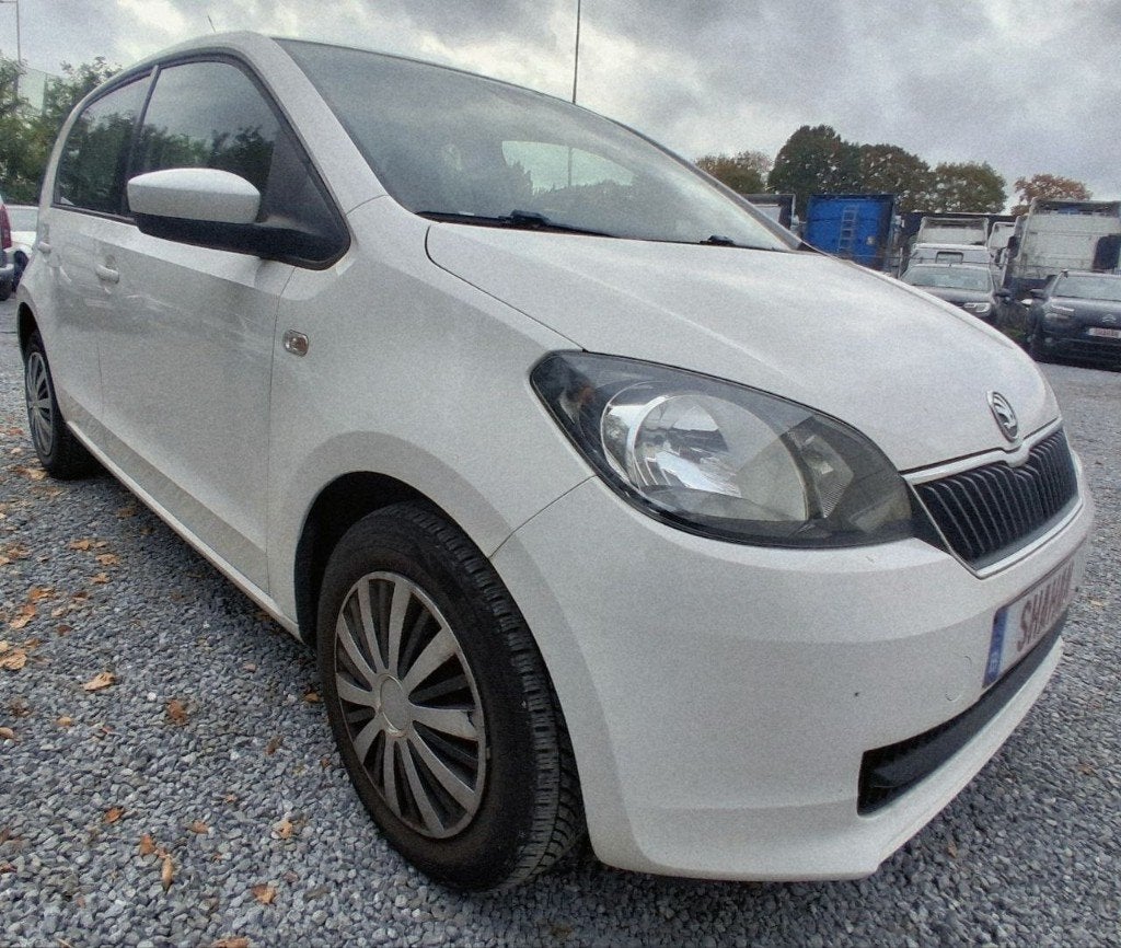 SKODA CITIGO 1.0 BENZINE – 60 PK – 12 MAANDEN GARANTIE, Auto's, Voorwielaandrijving, Stof, Bluetooth, Zwart