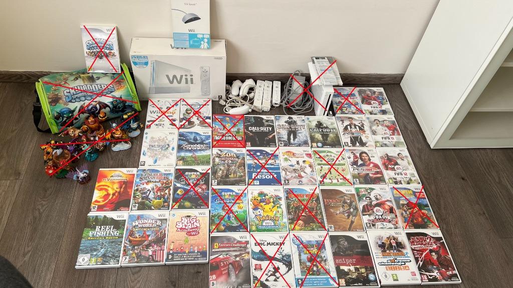 Nintendo Wii + 24 Games, Ophalen of Verzenden, Gebruikt, Met 3 controllers of meer, Met stuurtje