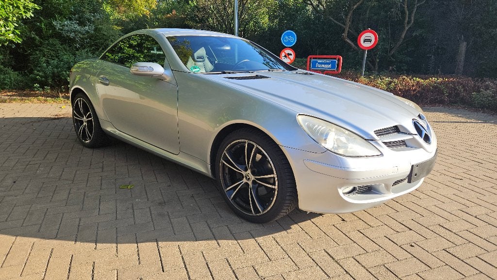 SLK200 kompressor Aut.leer,Airscarf,airco, navi,2007, Automaat, Dealer onderhouden, Achterwielaandrijving, Zwart