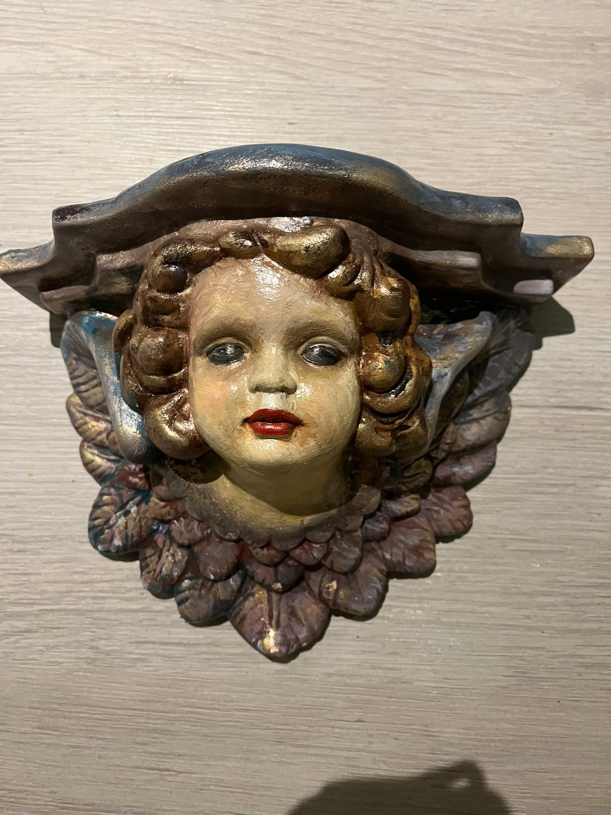 Wandconsole cherubijn, Ophalen