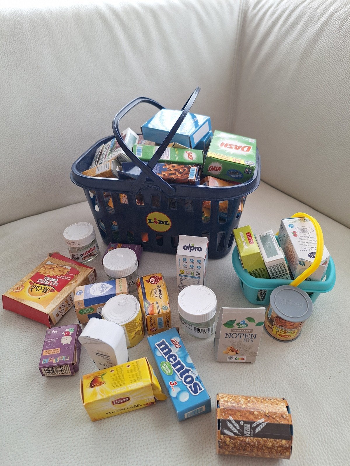 winkelmandje met boodschappen, Ophalen