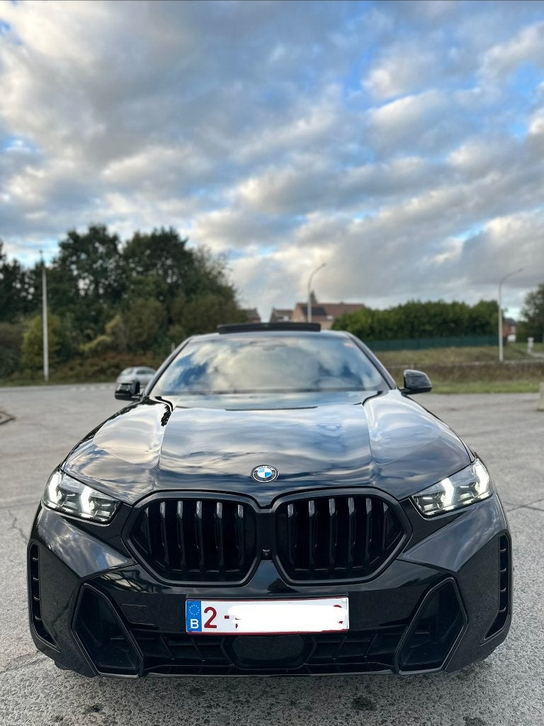 BMW X6 xDrive 40M SportPro 2024, Auto's, Automaat, 2240 kg, Euro 6, Zwart