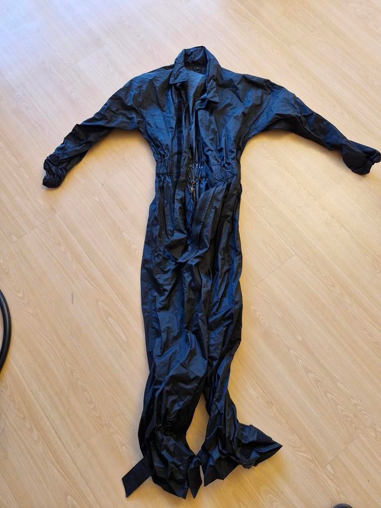 Combinaison pluie XS, Enlèvement