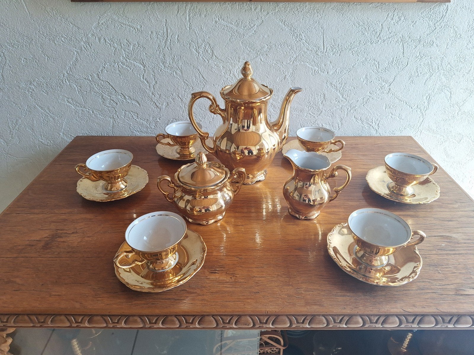 gouden koffieservies, Ophalen