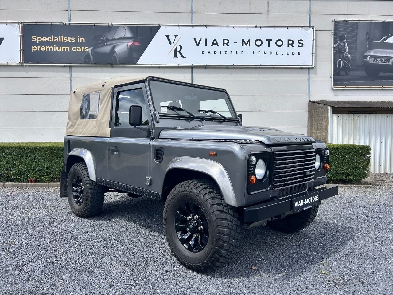 Land Rover Defender 90 E Soft Top-EERSTE EIGENAAR-lichte vra, Autos, Land Rover, Entreprise, 2 places, Noir