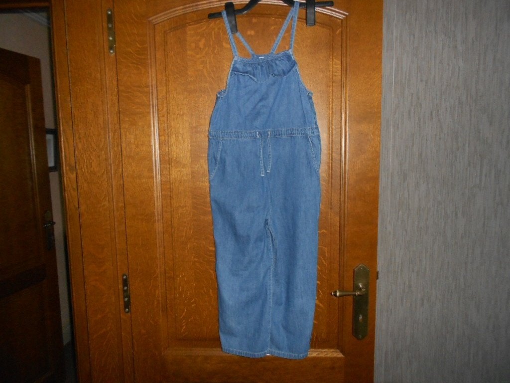 blauwe salopette in jeans mt 134, Kinderen en Baby's, Kinderkleding | Maat 134, Ophalen of Verzenden, Gebruikt, Meisje, Broek