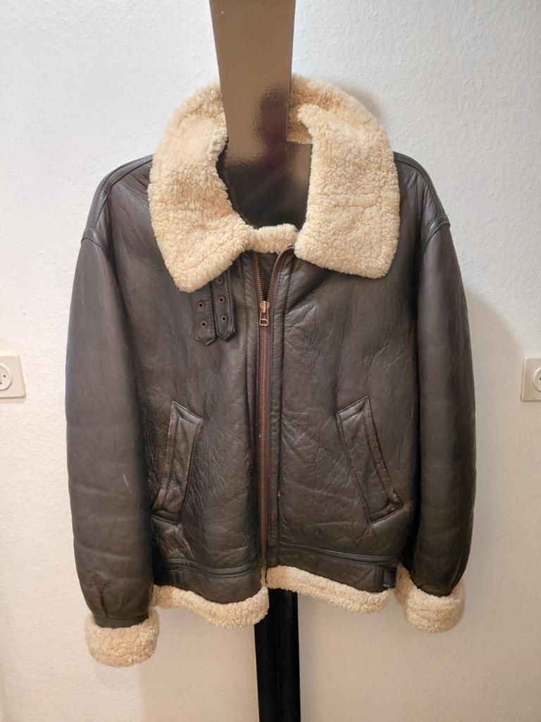 Jolie veste en mouton retourné taille S
