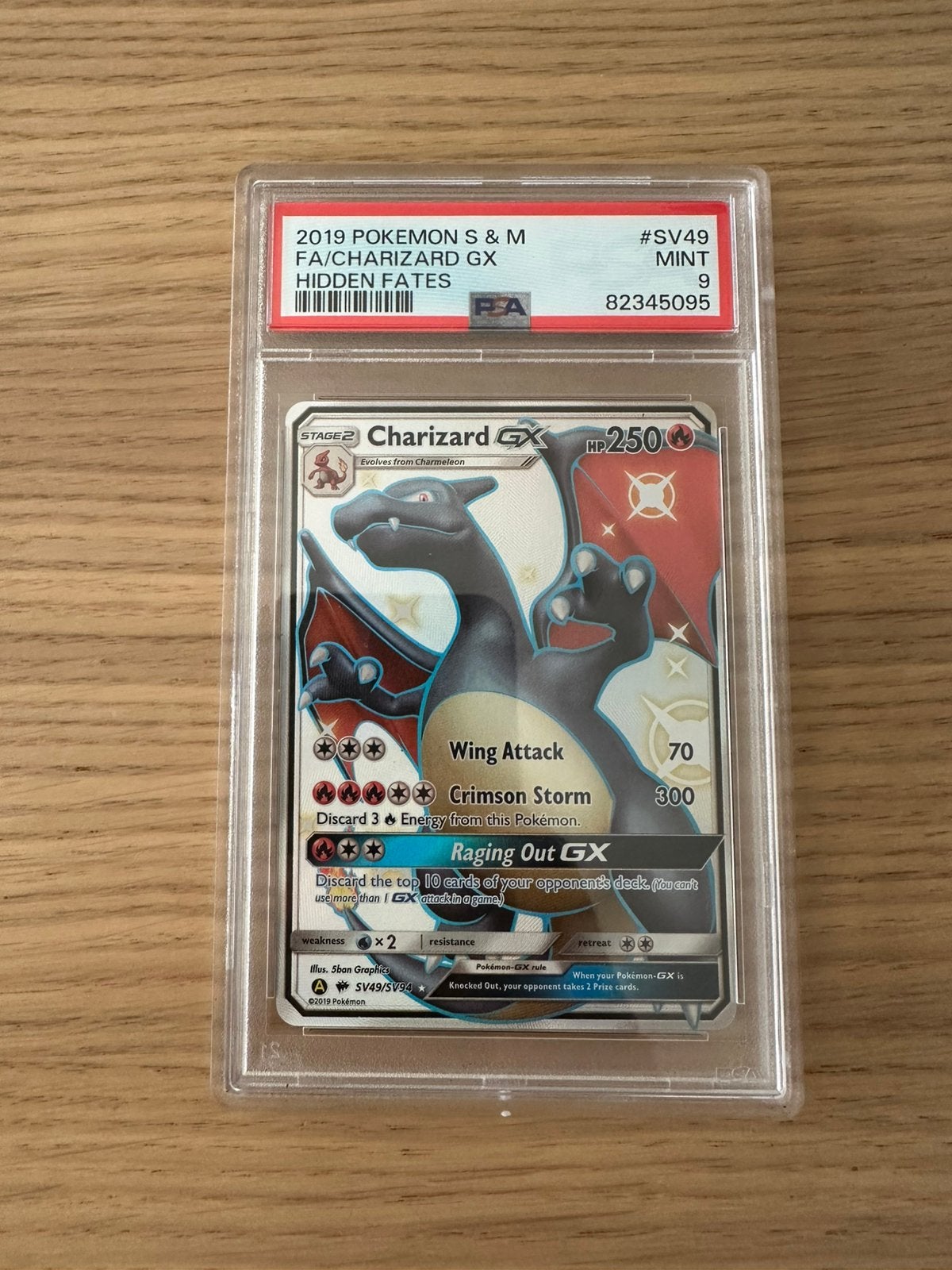Charizard GX PSA 9 Hidden Fates, Hobby en Vrije tijd, Ophalen of Verzenden, Zo goed als nieuw