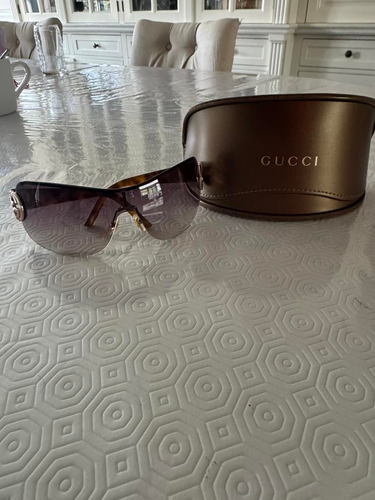Gucci zonnebril, Ophalen of Verzenden, Zo goed als nieuw, Zonnebril