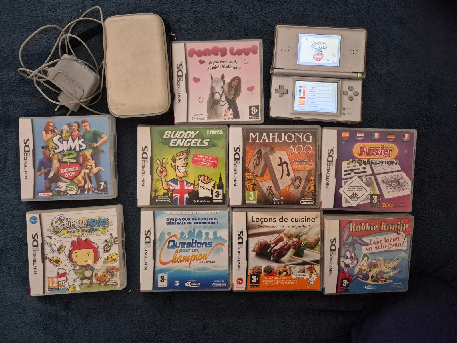 Nintendo ds lite met 9 games, Met games, Gebruikt, Ophalen of Verzenden, Zilver