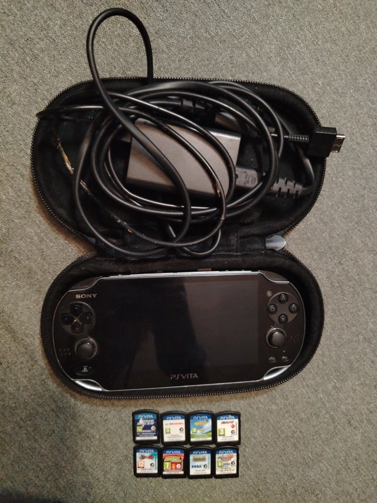PS Vita OLED + officiële hoes + 6 games, Games en Spelcomputers, Ophalen