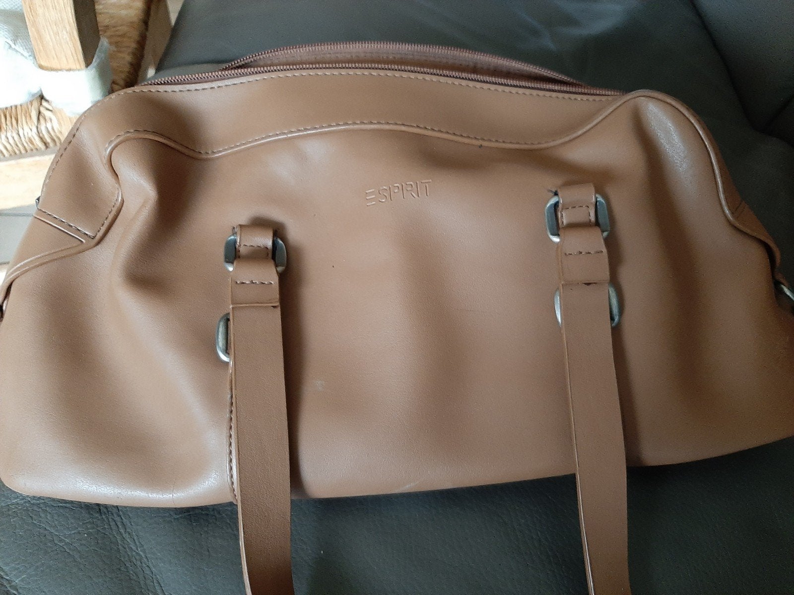 handtas Esprit, Ophalen