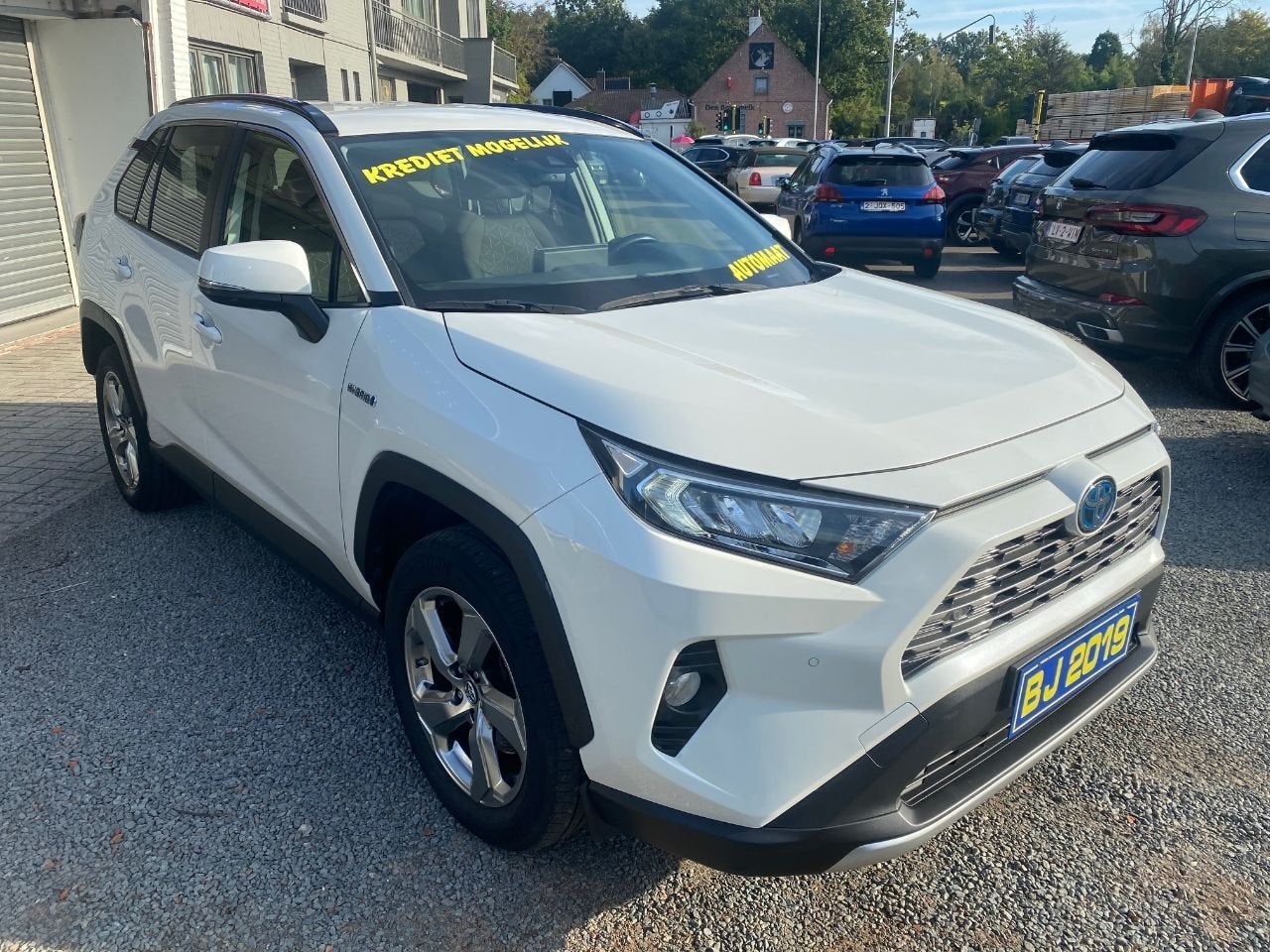Toyota RAV4 Hybrid 4x4 STYLE (bj 2019, automaat), Auto's, Stof, Gebruikt, Euro 6, 2487 cc