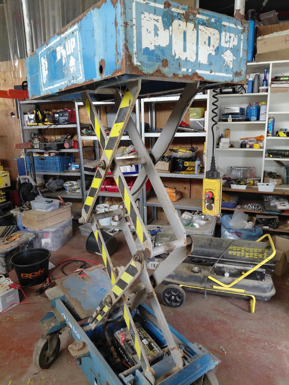 schaarlift popup, Ophalen