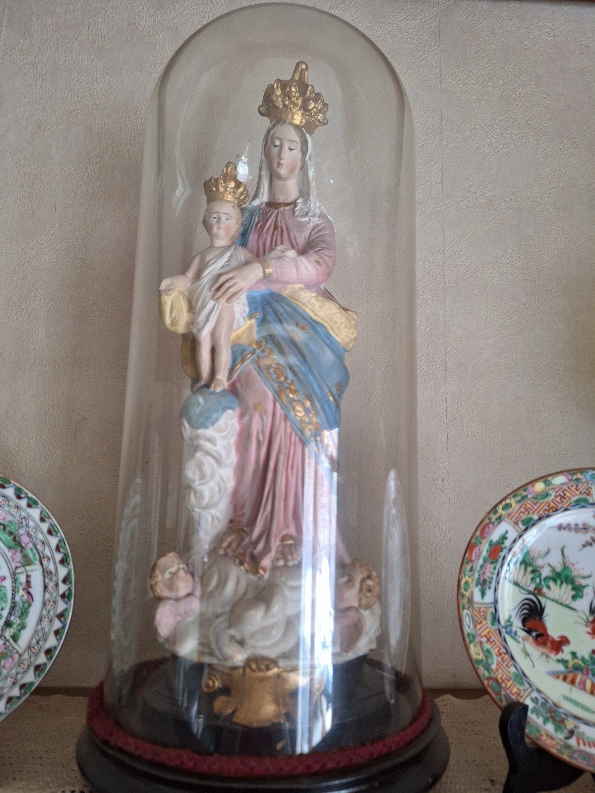 Mariabeeld onder stolp, Ophalen