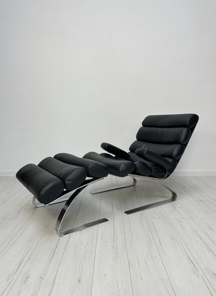 Fauteuil COR Sinus cuir noir avec repose-pieds vintage, Antiquités & Art, Enlèvement