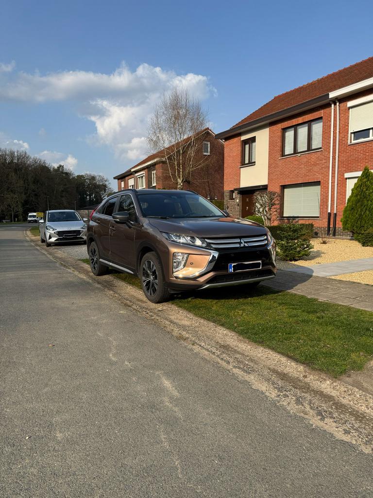 Mitsubishi Eclipse Cross 2021 44000 km 1.5 turbo benzine, Auto's, Mitsubishi, Voorwielaandrijving, Stof, 4 cilinders, Bruin