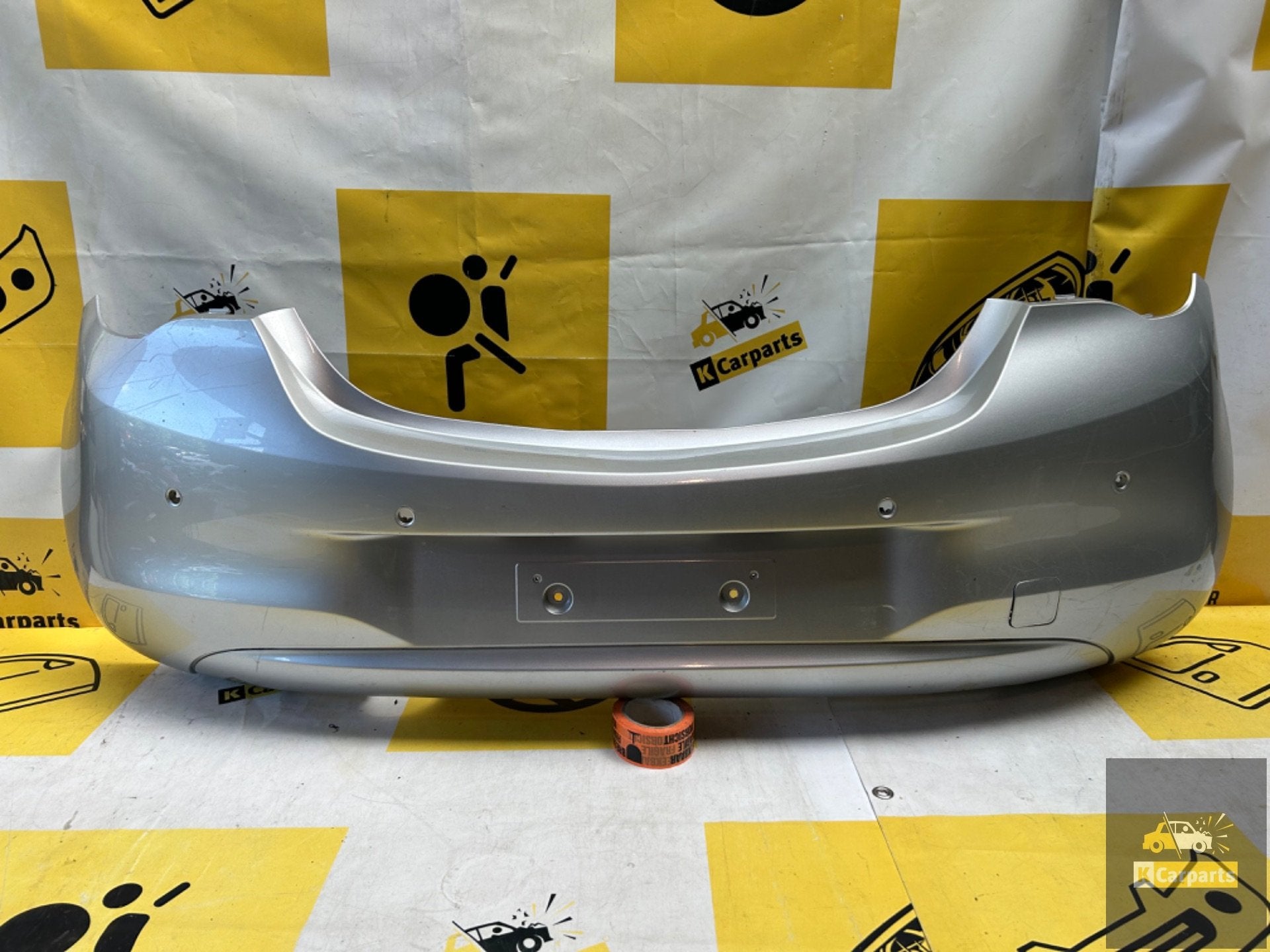 OPEL CORSA E Achterbumper 2014-2019 39002839 bumper 4xPDC, Info@fabrikant.eu, Fabrikantstraat 1
1000 AA  Amsterdam, NL, Opel, Achter