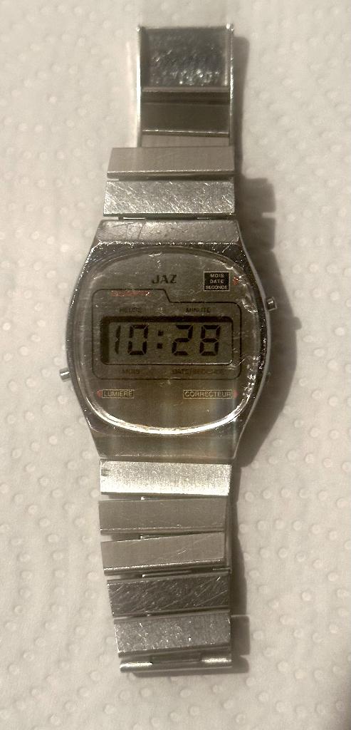 Montre LCD Jaz, Montre-bracelet, Autres marques, Enlèvement ou Envoi, Acier