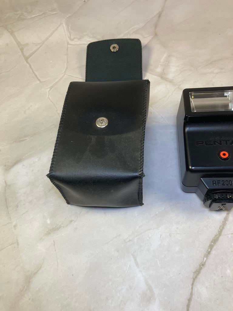 Flash électronique Pentax AF200S avec étui en cuir d'origine, Audio, Tv en Foto, Foto | Flitsers, Zo goed als nieuw, Pentax, Ophalen of Verzenden