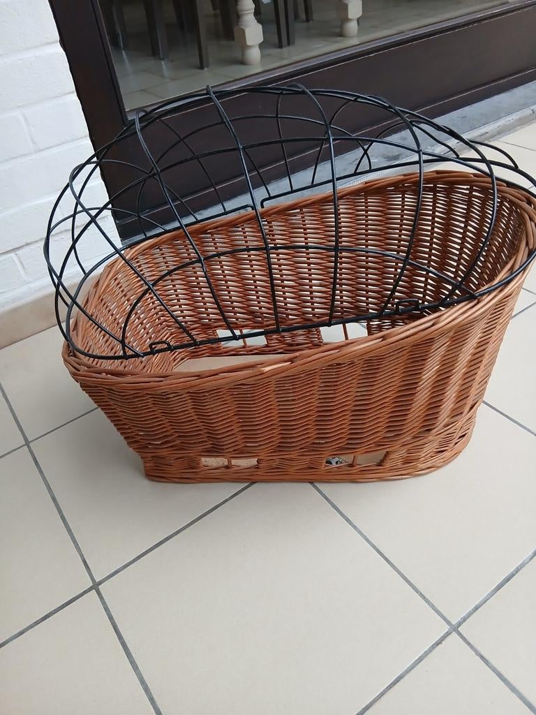 Rieten mand voor vervoeren hond, Ophalen