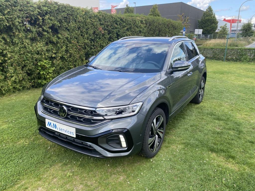 VOLKSWAGEN T-ROC BENZINE AUTOMAAT R-LINE NIEUWE WAGEN, Auto's, Volkswagen, 1498 cc, 4 cilinders, Bedrijf, Zilver of Grijs