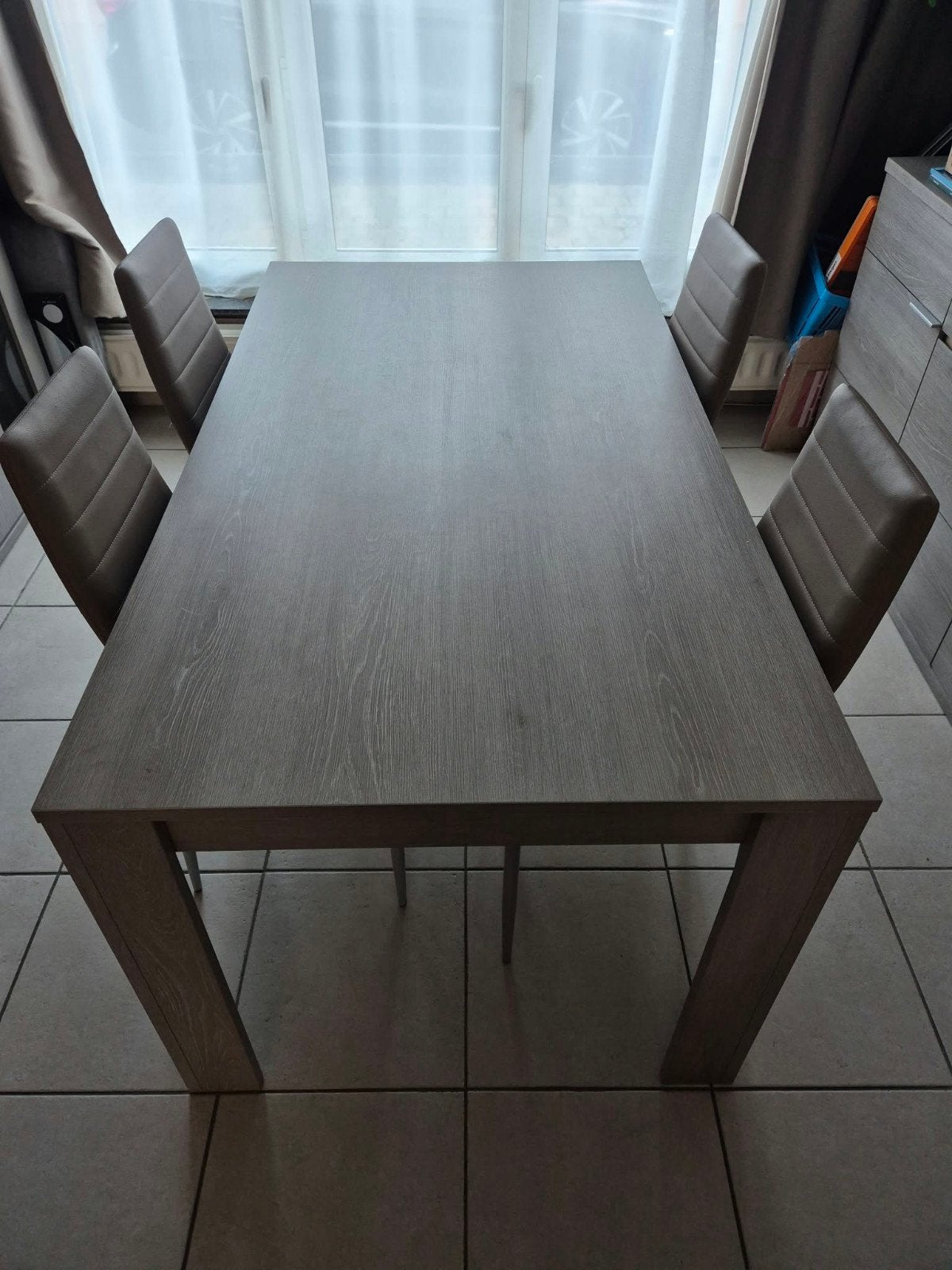 eetkamertafel zonder stoelen, Ophalen