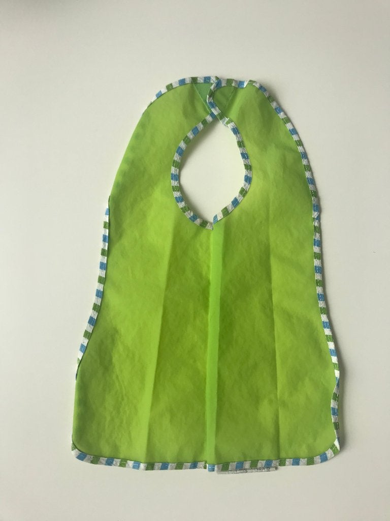 Bavoir en plastique vert, parfait état !, Enlèvement ou Envoi, Comme neuf, Autres types