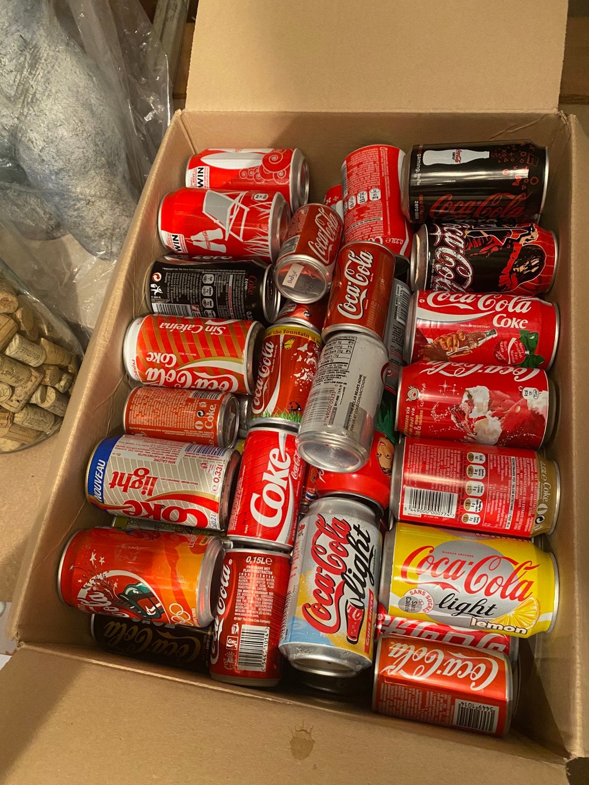Coca cola verzameling oude blikken., Ophalen