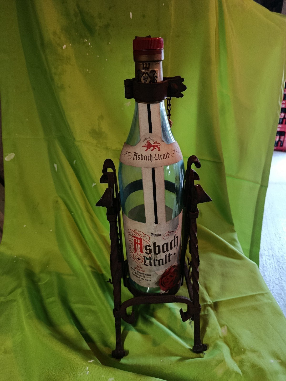 grote fles asbach uralt, Ophalen