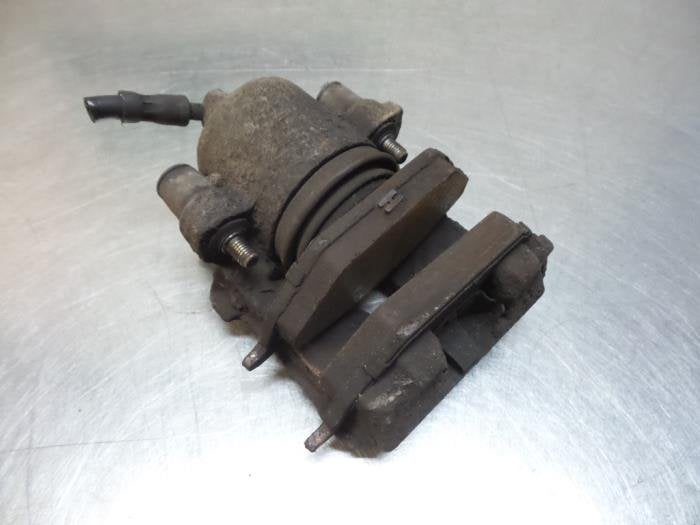 Remklauw (Tang) links-voor van een Volkswagen Polo (Polo 01-, Gebruikt, -, Volkswagen, -