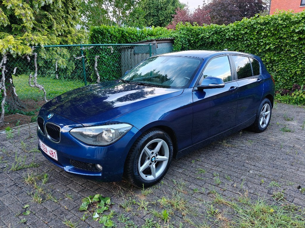BMW 116i automaat benzine, Auto's, Euro 5, Zwart, 4 cilinders, 5 zetels