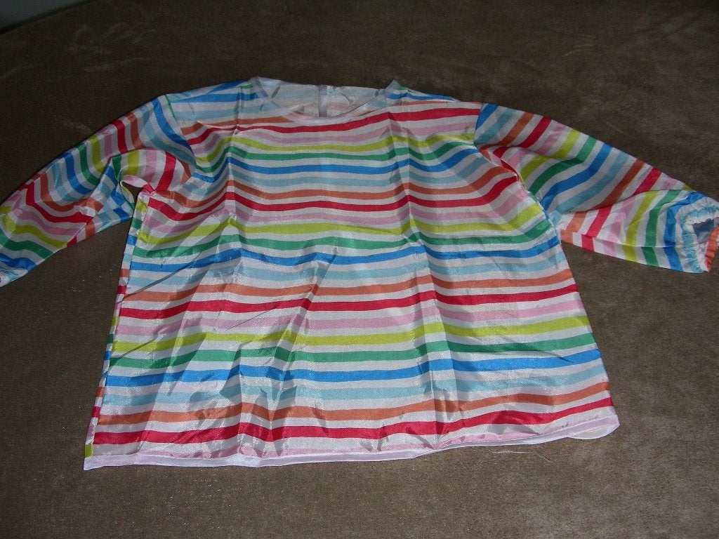 Plastieken schortje met velcro achteraan ideaal om te eten,, Kinderen en Baby's, Ophalen of Verzenden, Zo goed als nieuw, Slab