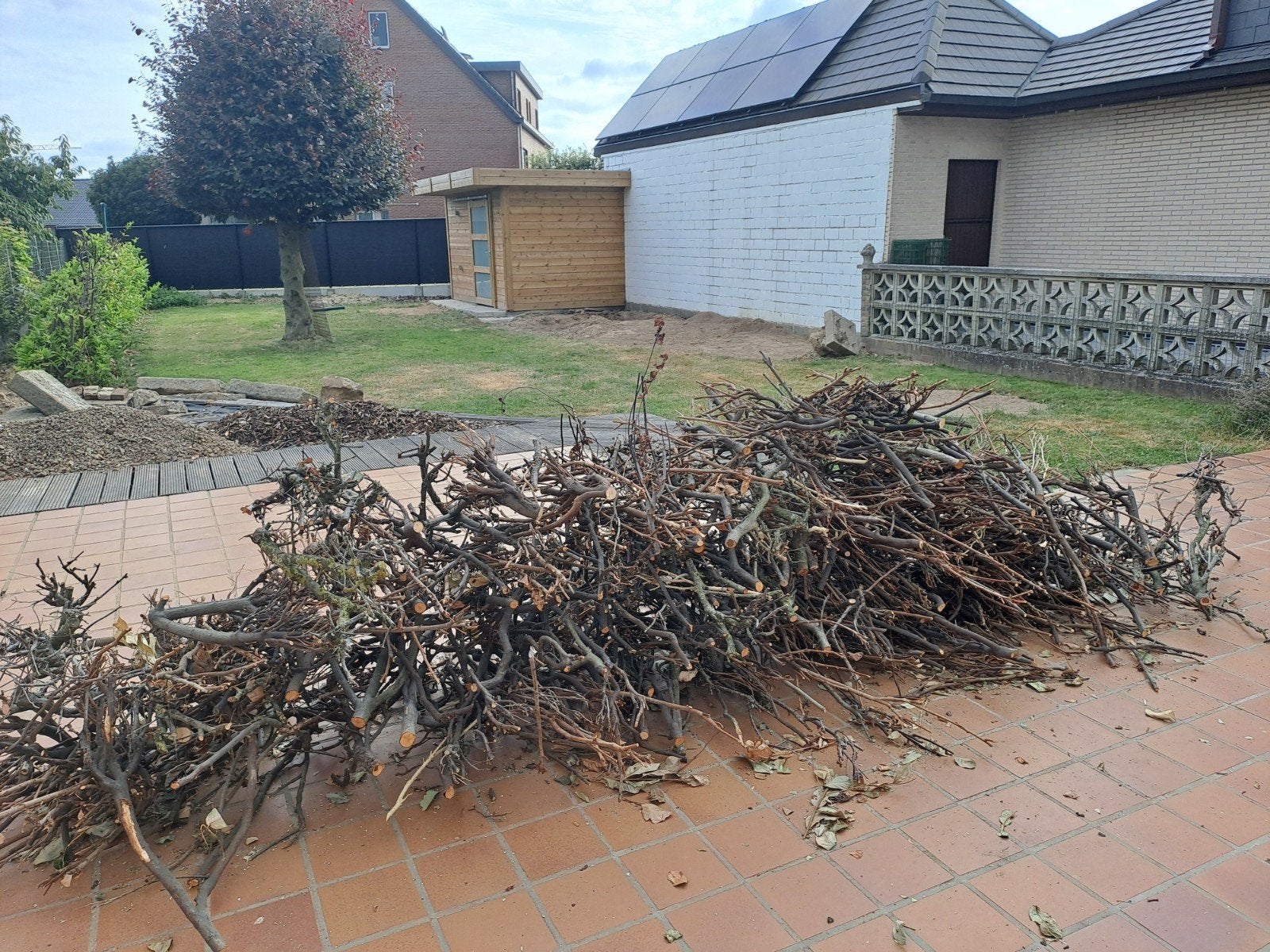 Brandhout te Sint-Maria- Oudenhove, Tuin en Terras, Ophalen