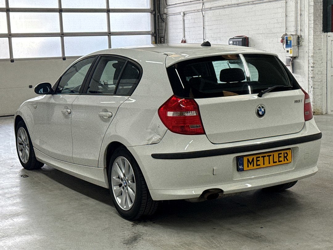 BMW 1-serie 116i Introduction | Airco | Schade, Autos, 139 g/km, Entreprise, Boîte manuelle, 5 portes