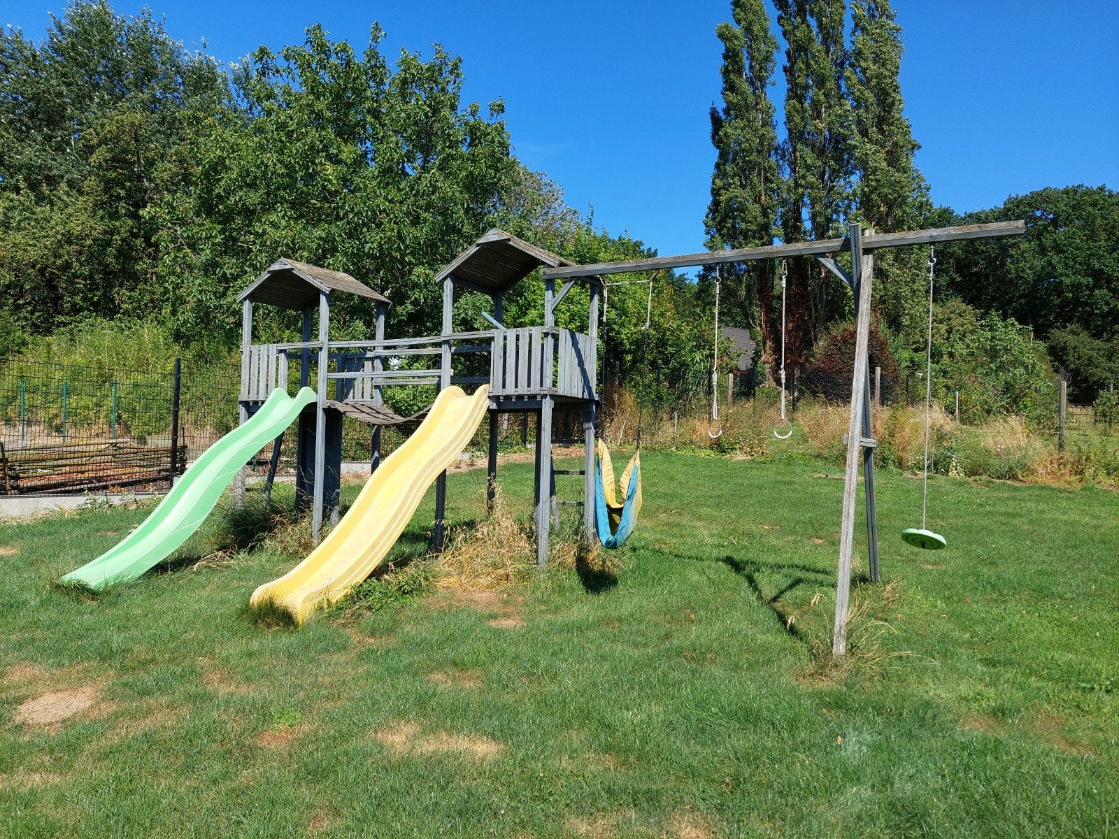 Gratis speeltorens met glijbanen en schommels, Enlèvement