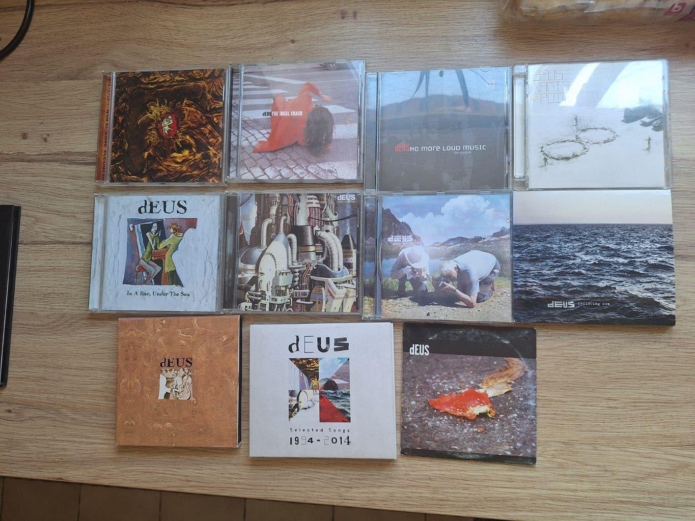 Collection de CD dEUS + livre photo + DVD, Enlèvement